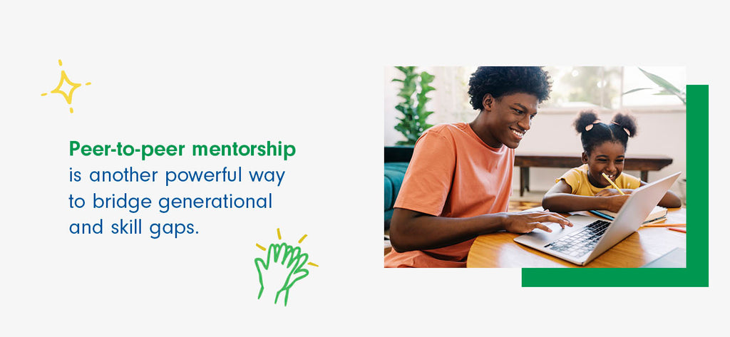 An older student mentors a younger peer